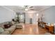 Inviting living room with wood floors, neutral color palette, and plenty of natural light at 285 Willow Shoals Dr, Covington, GA 30016