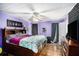 Spacious main bedroom with hardwood floors and large windows at 285 Willow Shoals Dr, Covington, GA 30016