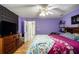 Spacious main bedroom with hardwood floors and large windows at 285 Willow Shoals Dr, Covington, GA 30016