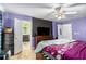 Spacious main bedroom with hardwood floors and large windows at 285 Willow Shoals Dr, Covington, GA 30016