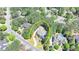 Aerial shot showcasing the property's location within a neighborhood surrounded by mature trees at 4505 Whitestone Way, Suwanee, GA 30024
