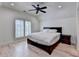Bedroom with ceiling fan, hardwood floors, and natural light at 4505 Whitestone Way, Suwanee, GA 30024
