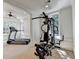 This well-lit exercise room offers multiple machines for your personal workout routine at 4505 Whitestone Way, Suwanee, GA 30024