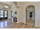 Gorgeous foyer with tile floors and a view of the home at 4505 Whitestone Way, Suwanee, GA 30024