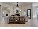 Bright living room showcasing a fireplace, hardwood floors, and large windows for natural light at 4505 Whitestone Way, Suwanee, GA 30024