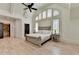 Spacious main bedroom with hardwood floors, ceiling fan and a walk-in closet at 4505 Whitestone Way, Suwanee, GA 30024