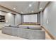 In-home movie theater boasts a large screen and comfortable seating for watching your favorite movies at 4505 Whitestone Way, Suwanee, GA 30024
