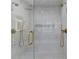 Luxurious walk-in shower with marble tile and dual shower heads at 4505 Whitestone Way, Suwanee, GA 30024