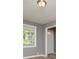 Cozy living room with neutral gray walls and plenty of natural light, creating a comfortable space at 8211 Thompson St, Douglasville, GA 30134