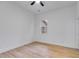 Spacious bedroom with hardwood flooring and a ceiling fan at 926 Welch Sw St, Atlanta, GA 30310
