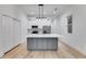Bright kitchen features a large island, stainless steel appliances, and plenty of storage at 926 Welch Sw St, Atlanta, GA 30310