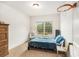 Bedroom with window view, wood dresser, and basketball hoop for activities at 1195 Awenasa Dr, Villa Rica, GA 30180