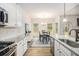 Bright, modern kitchen featuring granite countertops, stainless steel appliances, and ample cabinet space at 1195 Awenasa Dr, Villa Rica, GA 30180