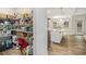 Spacious pantry with shelving for ample storage adjacent to the kitchen and island at 1195 Awenasa Dr, Villa Rica, GA 30180