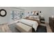 Cozy bedroom showcasing a large bay window, soft neutral tones, and elegant furniture at 3214 Cedar Bluff Ne Dr, Marietta, GA 30062