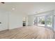 Spacious bedroom featuring wood-look floors, a bay window, and an attached bathroom at 3214 Cedar Bluff Ne Dr, Marietta, GA 30062