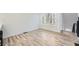 Bright and airy living area with wood floors and an abundance of natural light, perfect for relaxation and comfort at 3214 Cedar Bluff Ne Dr, Marietta, GA 30062