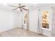 Bedroom features two large windows, neutral paint, ceiling fan and light wood floors at 383 6Th Ne St # 4, Atlanta, GA 30308