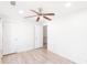 Bright bedroom features neutral paint, ceiling fan, light wood floors and two closets at 383 6Th Ne St # 4, Atlanta, GA 30308