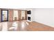 Spacious living room features a fireplace, hardwood floors, and ample natural light at 383 6Th Ne St # 4, Atlanta, GA 30308