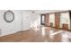 Inviting living room with hardwood floors, exposed brick, and sunlit windows at 383 6Th Ne St # 4, Atlanta, GA 30308