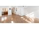 Spacious living room features hardwood floors, an archway, and is filled with natural light at 383 6Th Ne St # 4, Atlanta, GA 30308