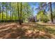 Large, fenced backyard with mature trees offering plenty of shade and privacy at 3898 Hadley Farm Dr, Marietta, GA 30066