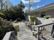 Back yard with wooden deck, mature landscaping, and outdoor seating area at 4519 Sims Ct, Tucker, GA 30084