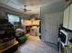 Functional laundry room with washer, dryer, storage cabinets, and window at 4519 Sims Ct, Tucker, GA 30084