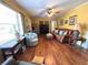 Warm and inviting living room featuring hardwood floors, a ceiling fan, and lots of natural light at 4519 Sims Ct, Tucker, GA 30084