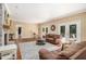 Inviting living room boasts hardwood floors, a cozy seating area, and access to an outdoor patio at 1935 Northbrooke Ln, Atlanta, GA 30338