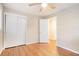 Bedroom with hardwood flooring, closet, and natural light at 2480 Warwick Ne Cir, Atlanta, GA 30345