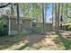 Brick home featuring a carport, situated among trees at 2480 Warwick Ne Cir, Atlanta, GA 30345