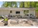 Inviting back patio with outdoor seating, perfect for entertaining and relaxation at 2574 Warwick Dr, Marietta, GA 30062