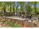 Backyard fire pit area with Adirondack chairs, perfect for outdoor gatherings and relaxation at 2574 Warwick Dr, Marietta, GA 30062