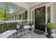 Cozy front porch with comfortable seating and elegant decor, perfect for enjoying the outdoors at 2574 Warwick Dr, Marietta, GA 30062