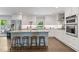 Modern kitchen with stainless steel appliances, granite countertops, and a central island with bar seating at 2574 Warwick Dr, Marietta, GA 30062