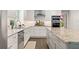 Well-equipped kitchen with granite countertops, stainless steel appliances, and ample cabinet space for storage at 2574 Warwick Dr, Marietta, GA 30062