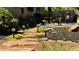 Beautifully landscaped walkway with decorative lighting leading to an inviting outdoor living space at 2574 Warwick Dr, Marietta, GA 30062