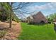 Green grass backyard with fence at 4650 Brighton View Trl, Cumming, GA 30040