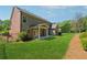 Green backyard with fenced in area and patio at 4650 Brighton View Trl, Cumming, GA 30040