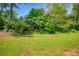 Lush backyard perfect for outdoor activities and relaxation at 4992 Meadow Ln, Marietta, GA 30068
