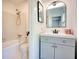 Updated bathroom features a white vanity and shower-tub combination at 4992 Meadow Ln, Marietta, GA 30068