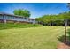 Well-manicured lawn adjacent to the condo building offering green space and pleasant views at 4992 Meadow Ln, Marietta, GA 30068