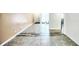 Long hallway featuring a unique blend of tile and wood flooring at 4992 Meadow Ln, Marietta, GA 30068