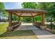 Community pavilion with seating and a grill, perfect for outdoor gatherings and relaxation at 4992 Meadow Ln, Marietta, GA 30068