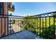Balcony with black metal railing provides a view of the city and trees at 3235 Roswell Ne Rd # 721, Atlanta, GA 30305