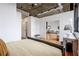 Spacious bedroom featuring hardwood floors and a view into the open floor plan at 3235 Roswell Ne Rd # 721, Atlanta, GA 30305