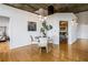 Cozy dining area with hardwood floors, modern lighting, and easy access to rooms at 3235 Roswell Ne Rd # 721, Atlanta, GA 30305