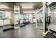 Modern gym with treadmills, stationary bikes, weight machines, and mirrored wall at 3235 Roswell Ne Rd # 721, Atlanta, GA 30305